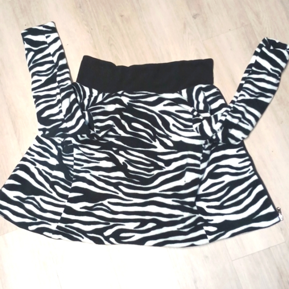 Women's Reversible Zebra stripes or Black jacket. Size Small